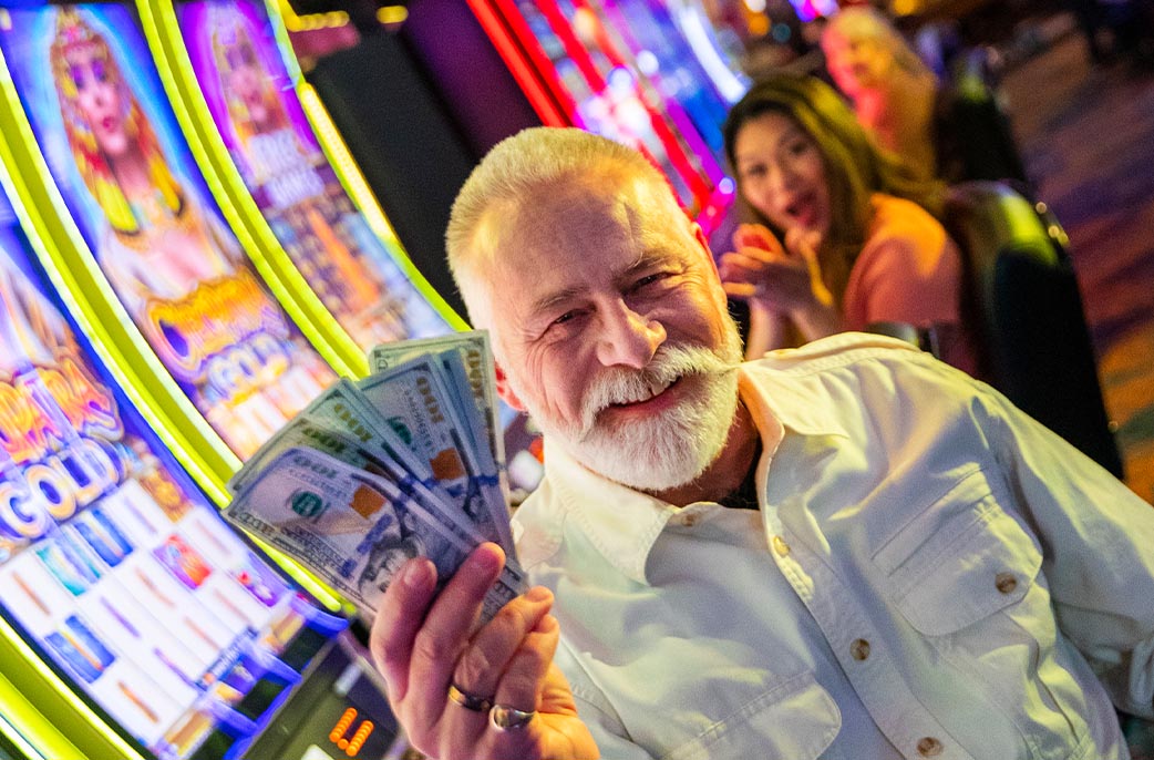 Man wining money at casino
